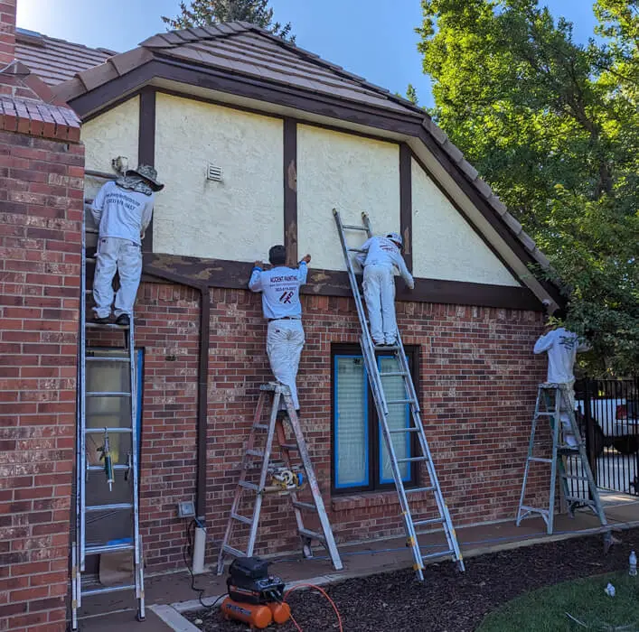 Accent painting crew working on a exterior painting in denver