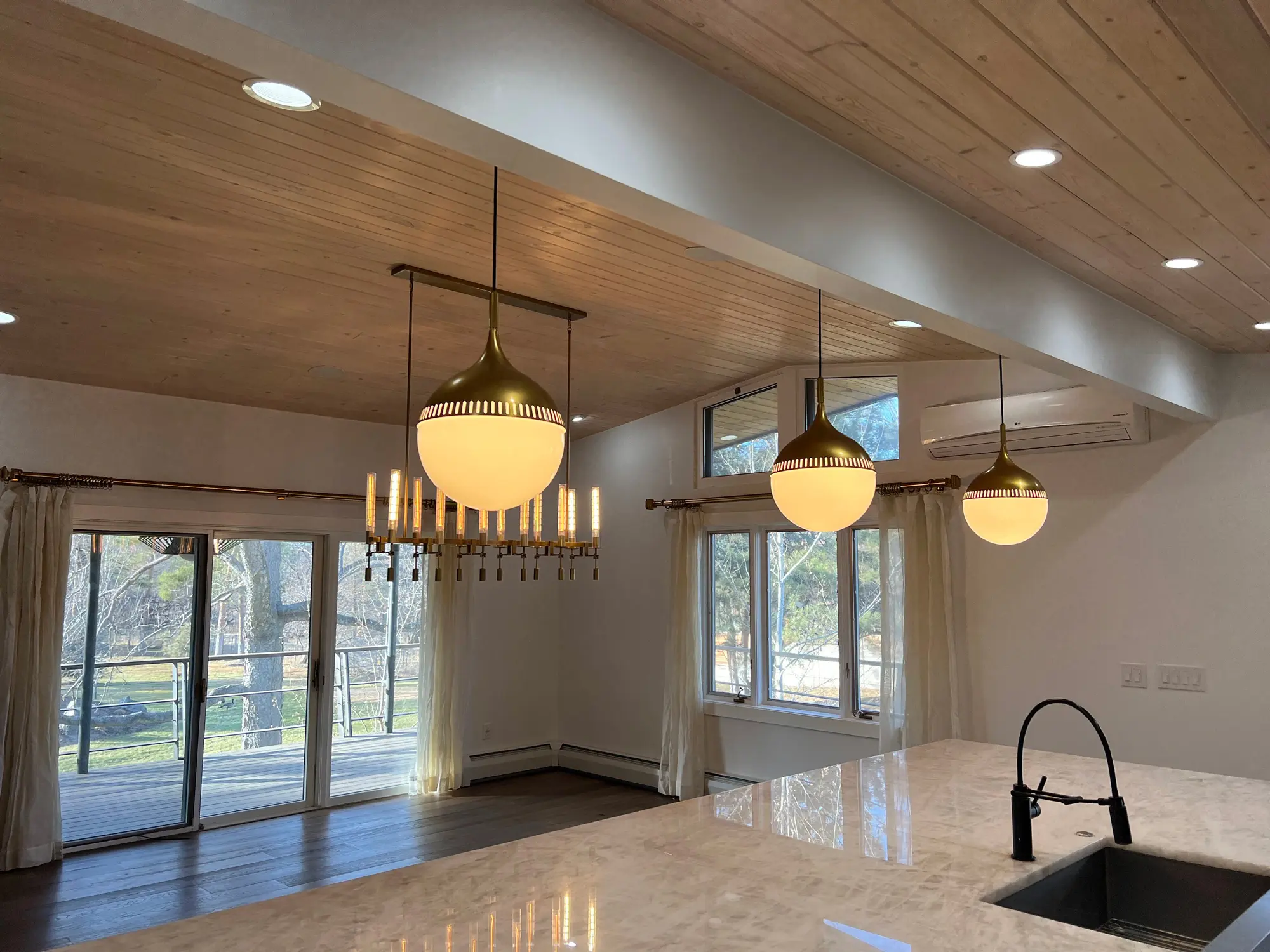 interior painting Denver CO freshly painted open concept kitchen living area white walls