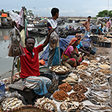 Customer profile image: people selling goods in open air market
