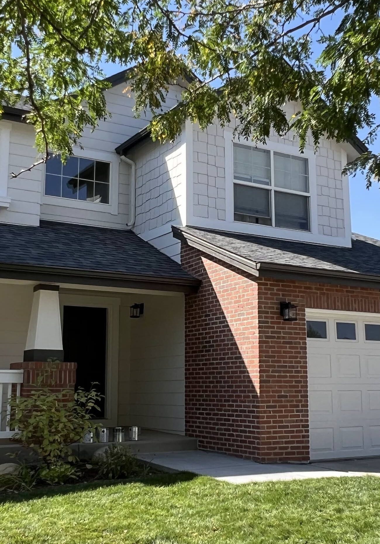 Professional exterior residential painting services by Accent Painting, showcasing a completed home repaint project in Arvada, CO.